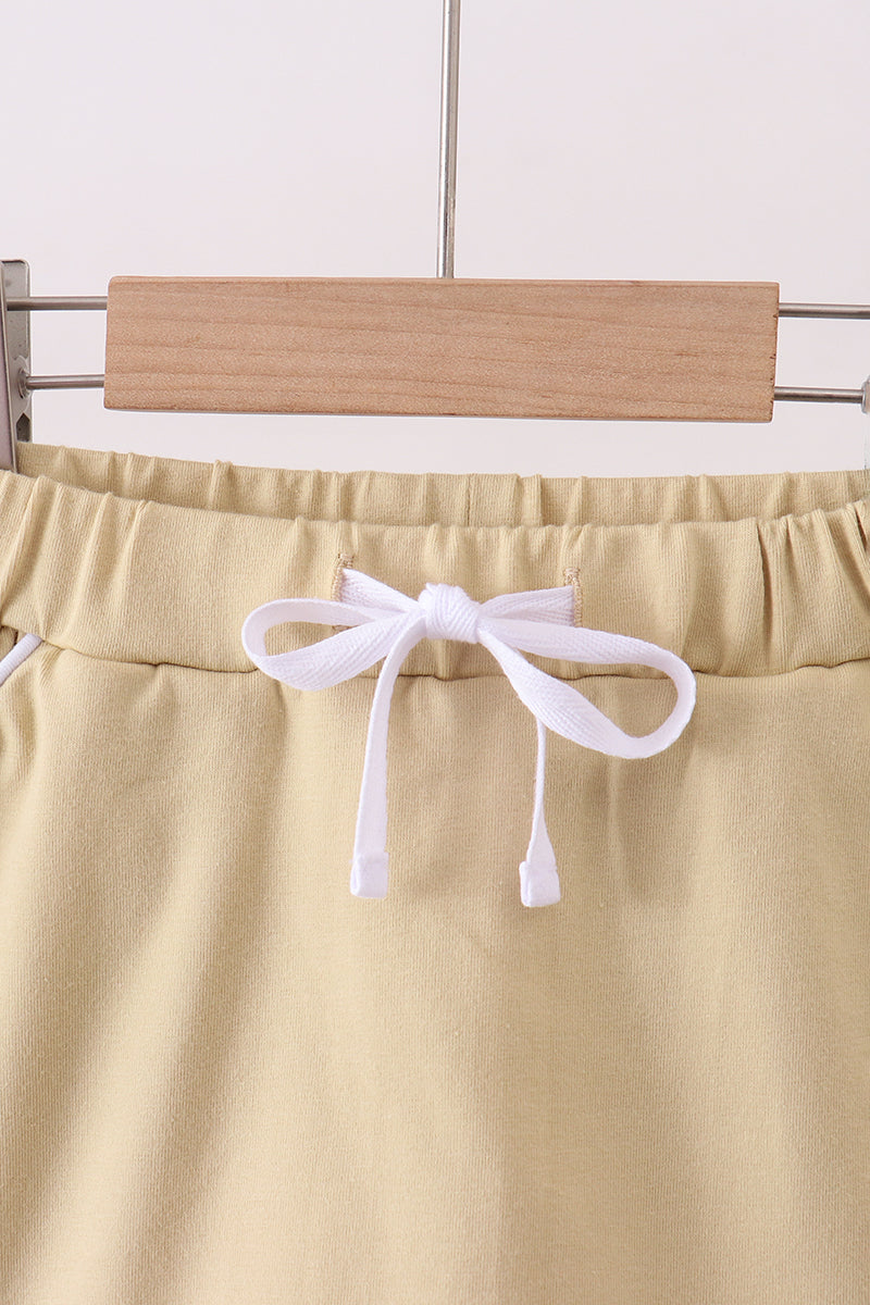 Khaki scallop hem bow skort