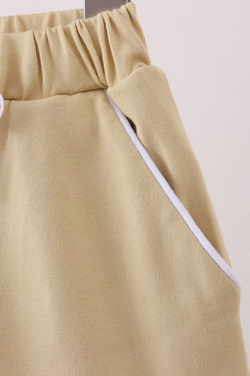 Khaki scallop hem bow skort